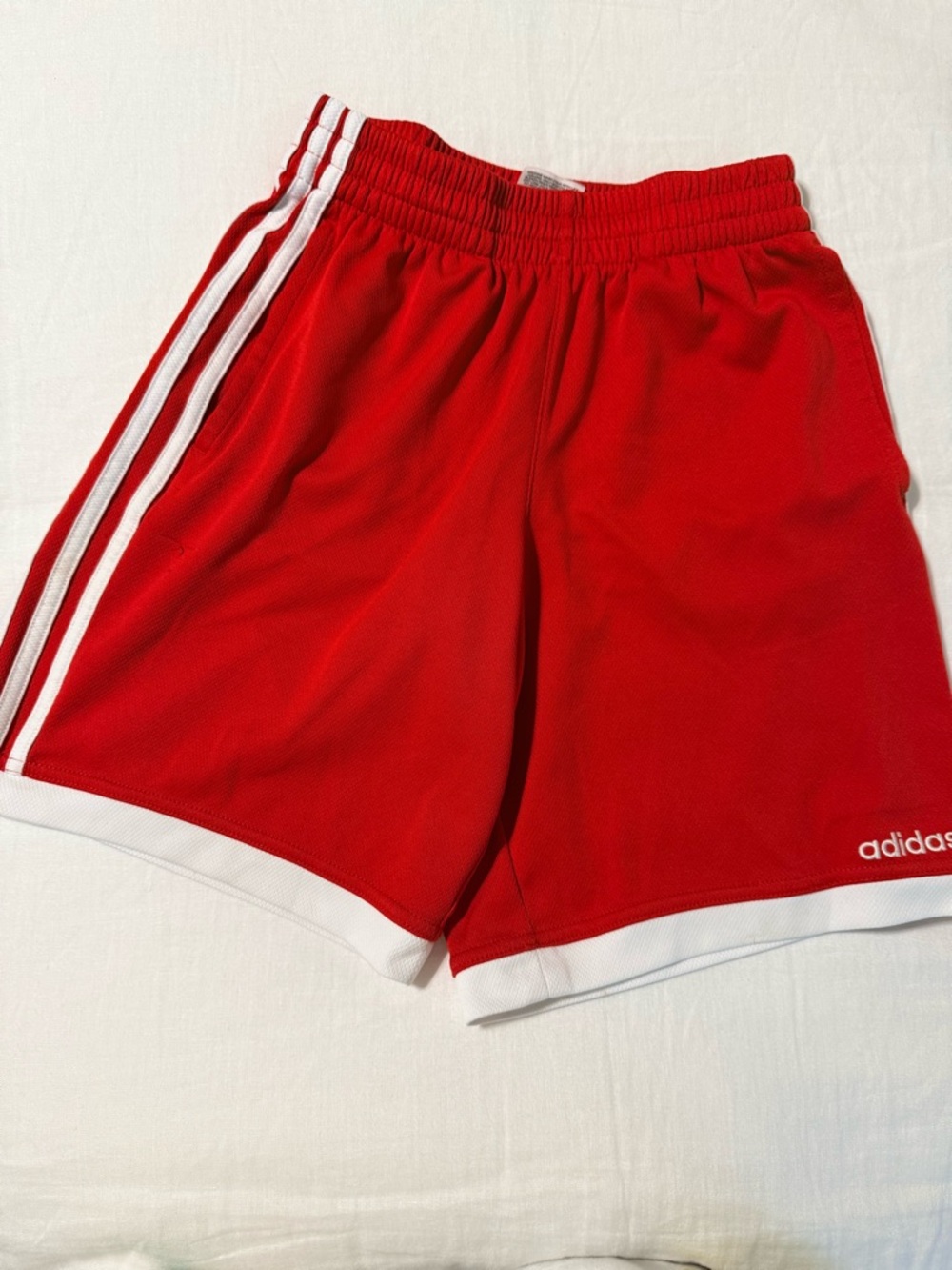 Adidas red athletic shorts with White Stripes size M(10/12) for boys